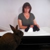 Scamp learning rabbit massage techniques
