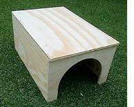 basic wooden hideaway with walls and no floor